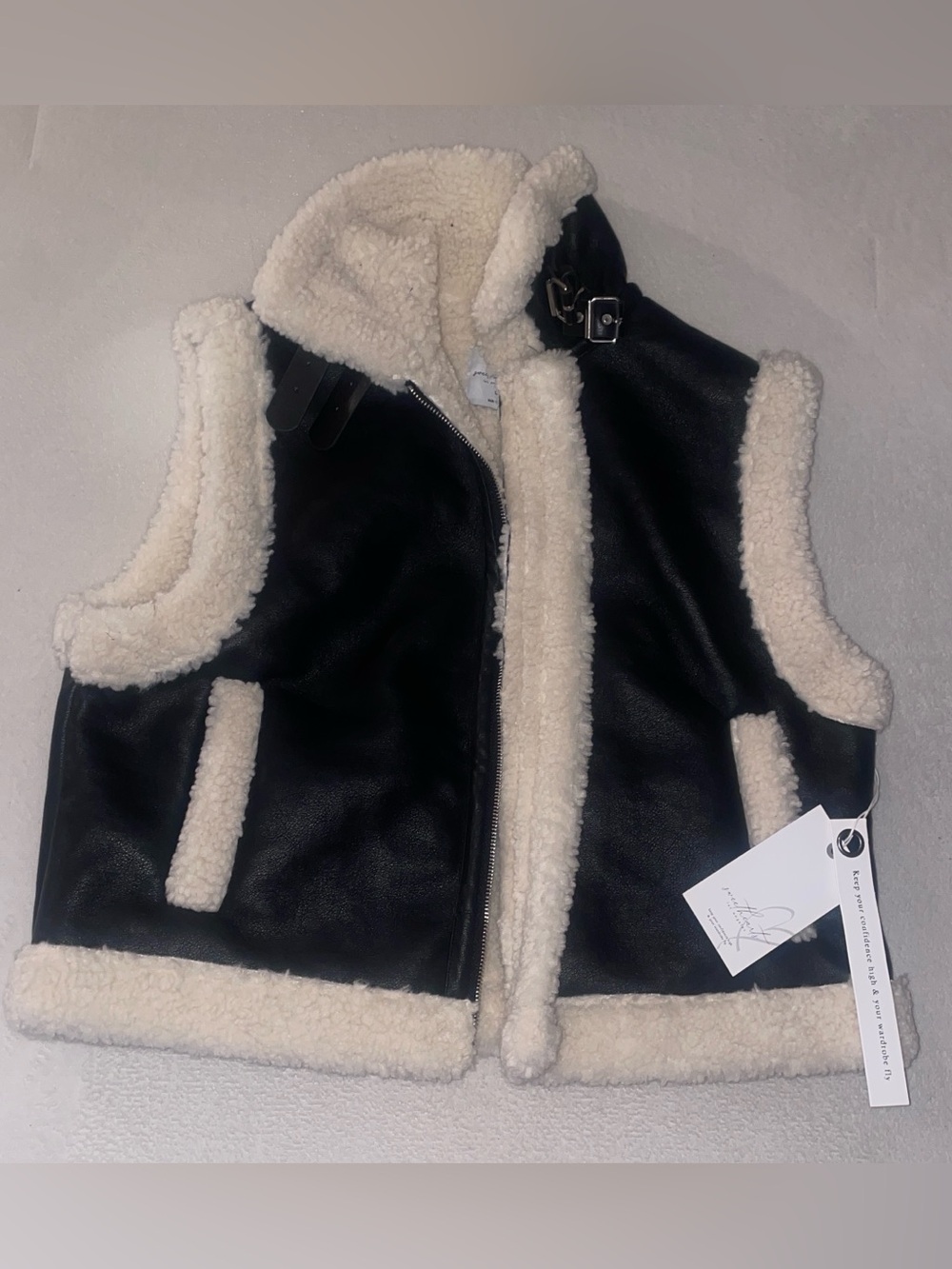 Woman’s Sherpa-Lined Faux Leather Vest - Black and Cream